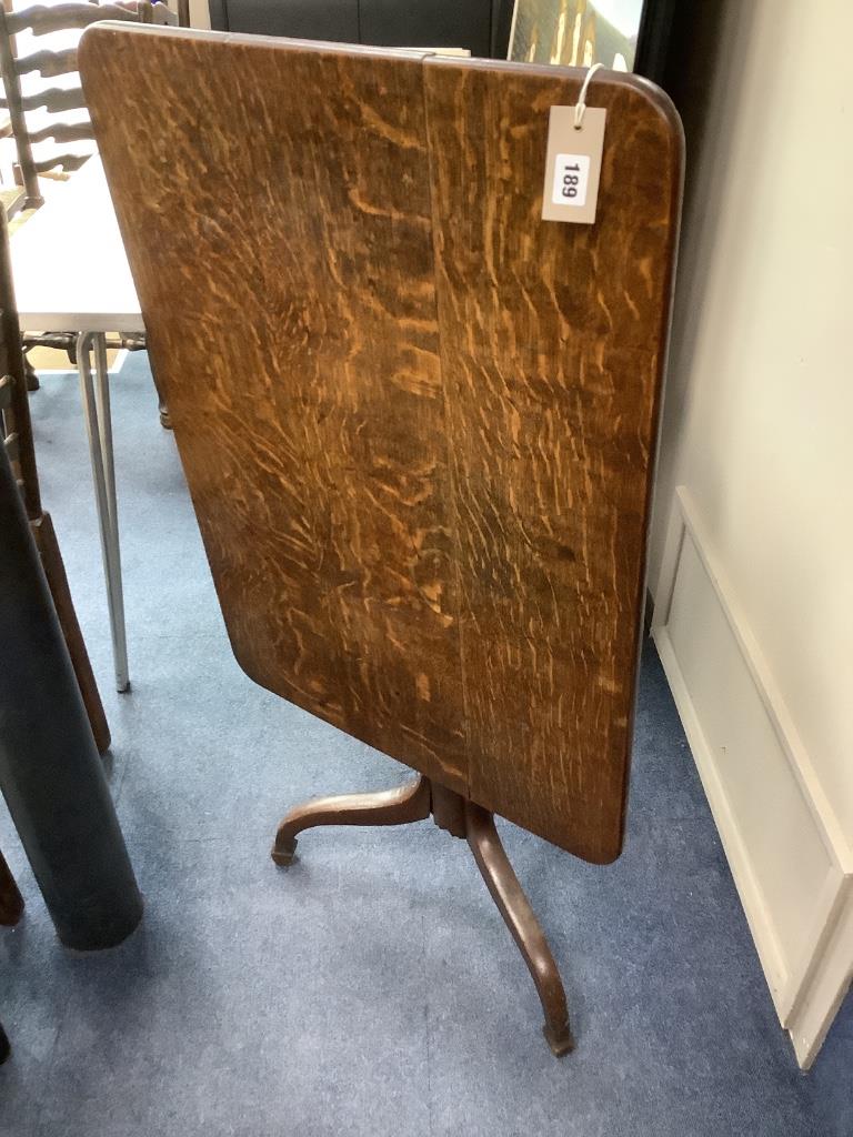 A Victorian oak tilt top tripod tea table, width 82cm, depth 59cm, height 72cm